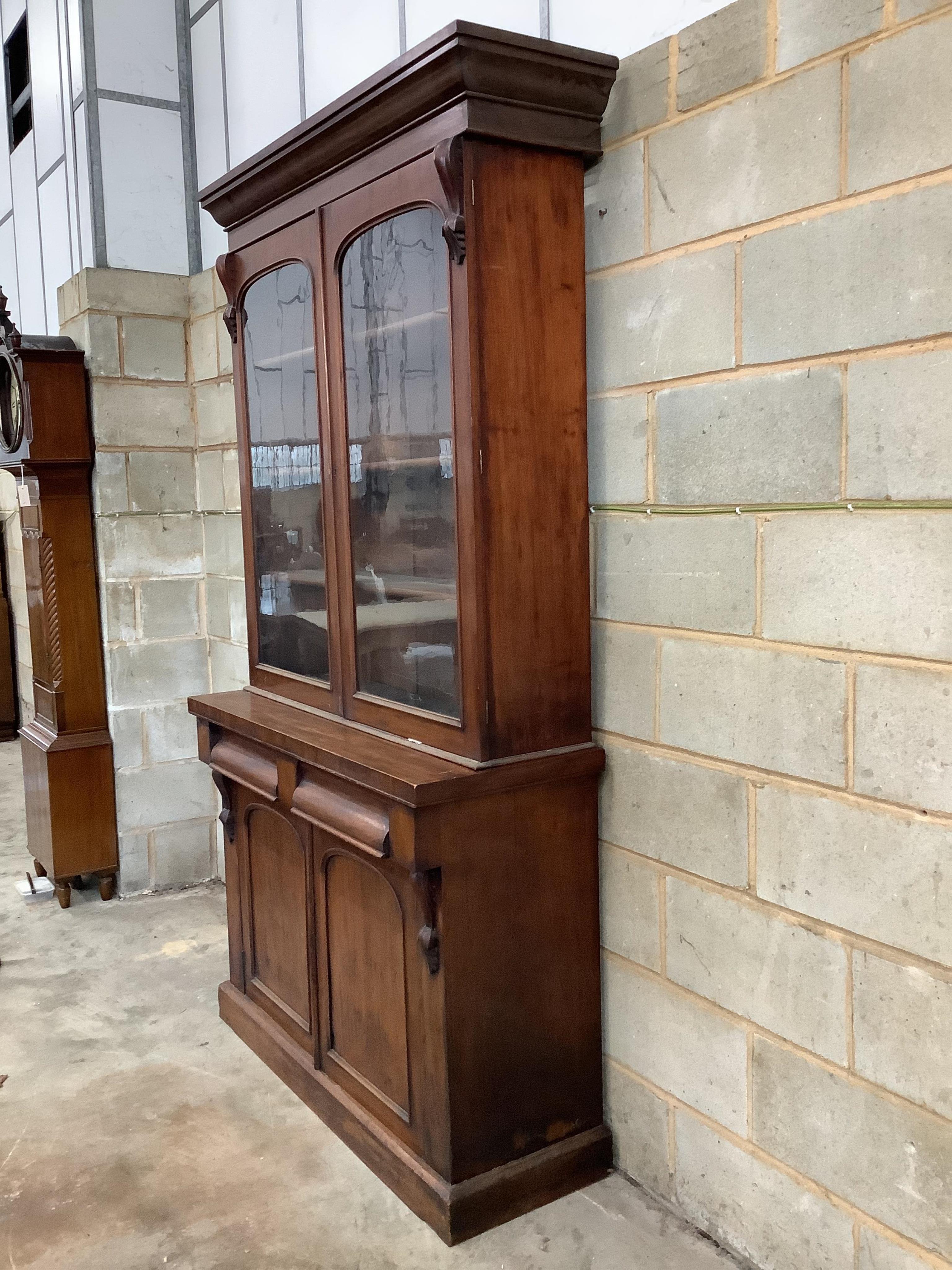 A Victorian mahogany chiffonier bookcase, width 121cm, depth 45cm, height 223cm. Condition - fair